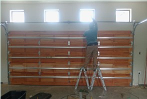 Sectional garage door installation in progress